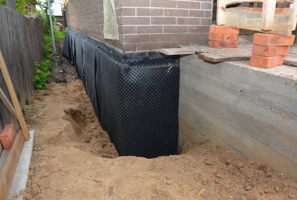 Happy homeowners after waterproofing job in Seneca Falls